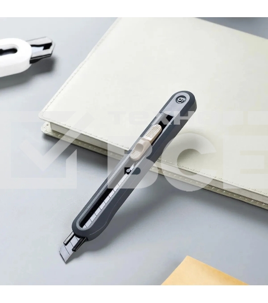 Нож канцелярский Deli ENS063-GR Nusign, ширина лезвия 9 мм, фиксатор сталь серый