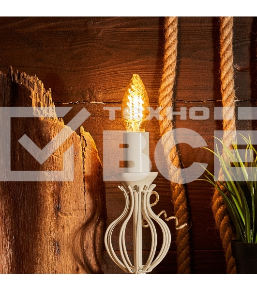 Лампа светодиодная филаментная Rexant Витая свеча LCW35 7.5 Вт 600 Лм 2400K E14 золотистая колба