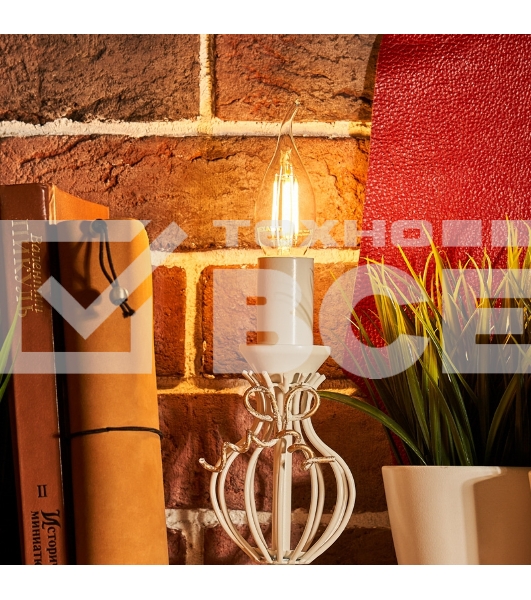 Лампа светодиодная филаментная Rexant Свеча на ветру CN37 9.5 Вт 950 Лм 2700K E14 прозрачная колба