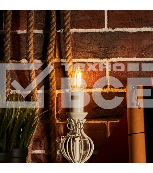 Лампа светодиодная филаментная Rexant Свеча CN35 7.5 Вт 600 Лм 2700K E14 диммируемая, прозрачная колба